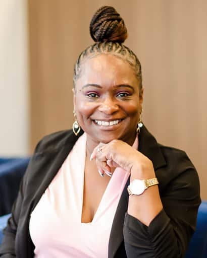 Headshot of senior paralegal Veronica Tabor smiling in a black blazer